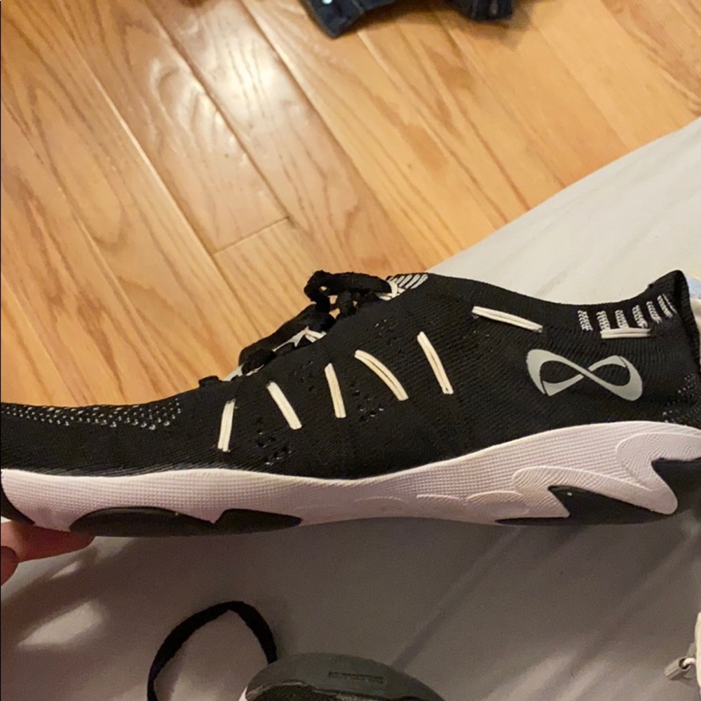 Black Nfinity cheerleading sneakers